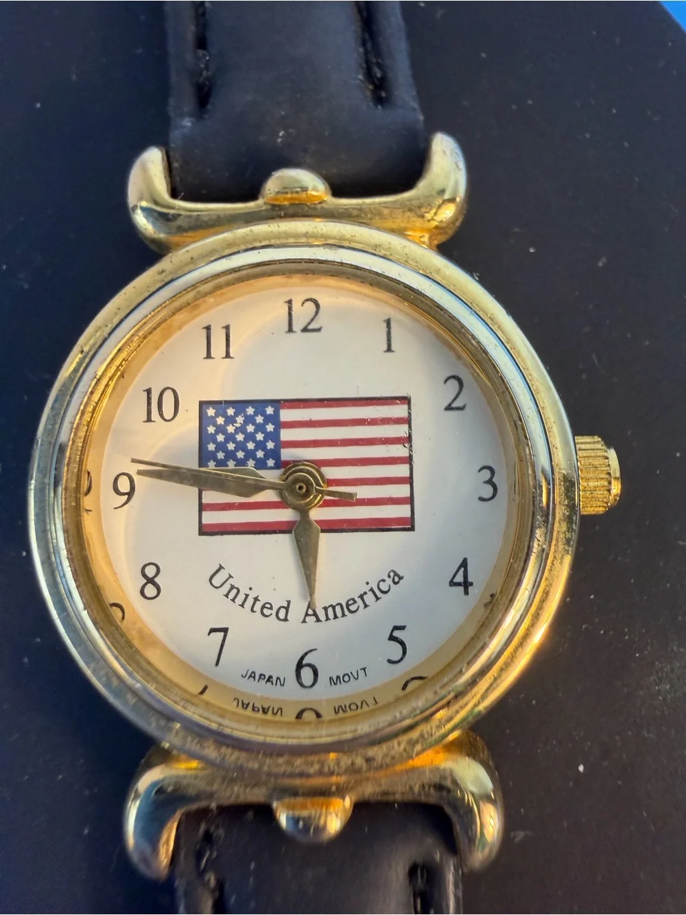 Gold Dial Black Leather Strap Women's Watch with American Flag Accent